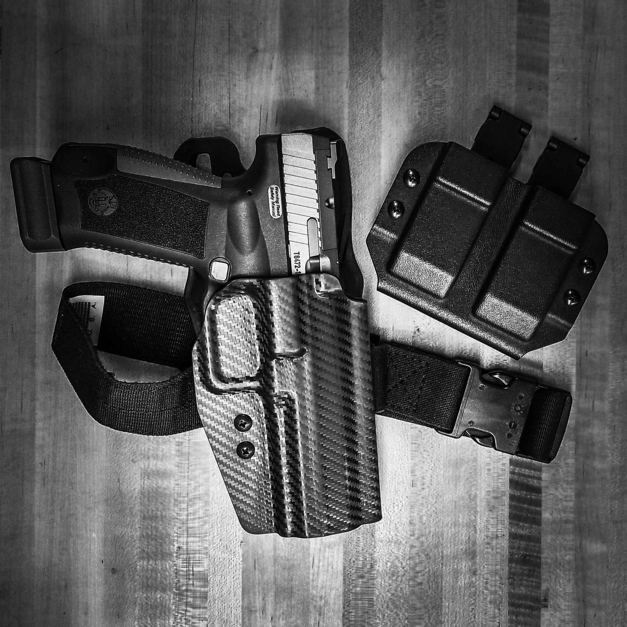 For the best OWB Outside Waistband Duty and Competition Holster designed to fit the Canik TP9 TP9SFX full-size pistols, shop Four Brothers Holsters. Perfect for USPSA, 3-Gun, Steel Challenge, and other competitive shooting sports. Adjustable retention, Open muzzle for threaded barrels. Made in the USA