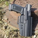 Outside Waistband Taco Style Holster designed to fit the Canik TP9SFX full size pistols. Adjustable retention and high sweat shield. .080" Thermoplastic. Removeable threadlocker applied to all screws. Open muzzle for threaded barrels and to allow dust, debri and that pesky last brass case to pass right on through.