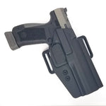Outside Waistband Taco Style Holster designed to fit the Canik TP9 full size pistols. Holster is designed with adjustable retention High sweat shield and open muzzle design to allow threaded barrels and to allow dust, debri and that pesky last brass case to pass right on through.