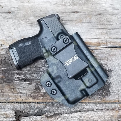 Inside Waistband Holster designed to fit the Sig P365 or P365X pistol with Streamlight TLR-6 light. Holster has adjustable retention,  high sweat shield standard. Profile of the holster cut to allow a red dot sight.  Open muzzle for threaded barrels.