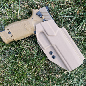 Outside waistband holster designed to fit all Sig P320 pistols with the Align Tactical Thumb Rest Takedown Lever installed. Holster fits the Compact, Carry, M17, M18, X5 and Legion pistols. Profile cut to work with red dot sights, including the Trijicon SRO Open Muzzle adjustable retention,  assembled in the USA 