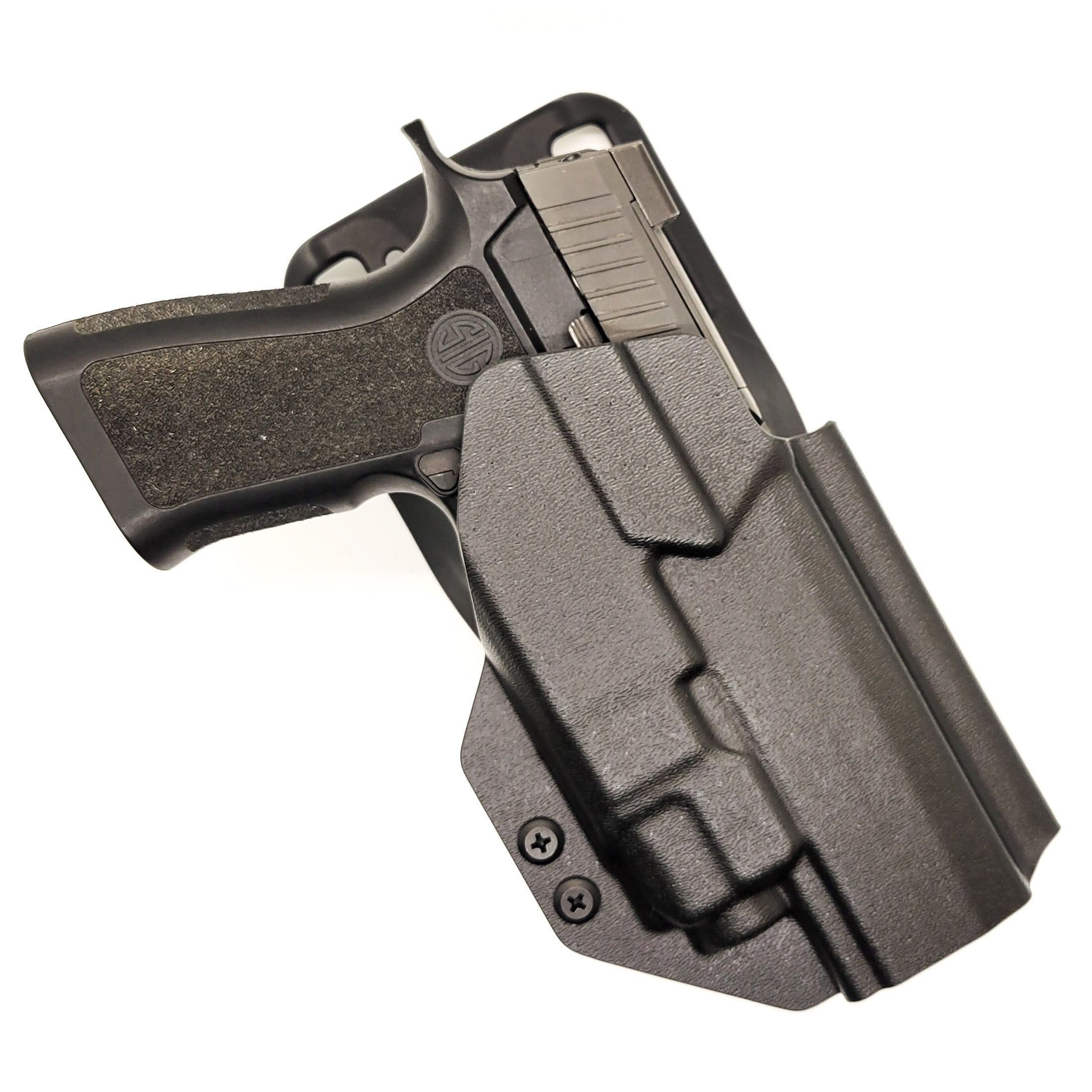 Outside waistband duty/competition style holster designed to fit the Full Size and Carry P320 series with Streamlight TLR-8 and TLR-8A weapon mounted light and Align Tactical Thumb Rest Takedown Lever. Holster will accommodate the M17, M18, and X-Five models as well as the Carry and Compact using our competition belt mounting options. 