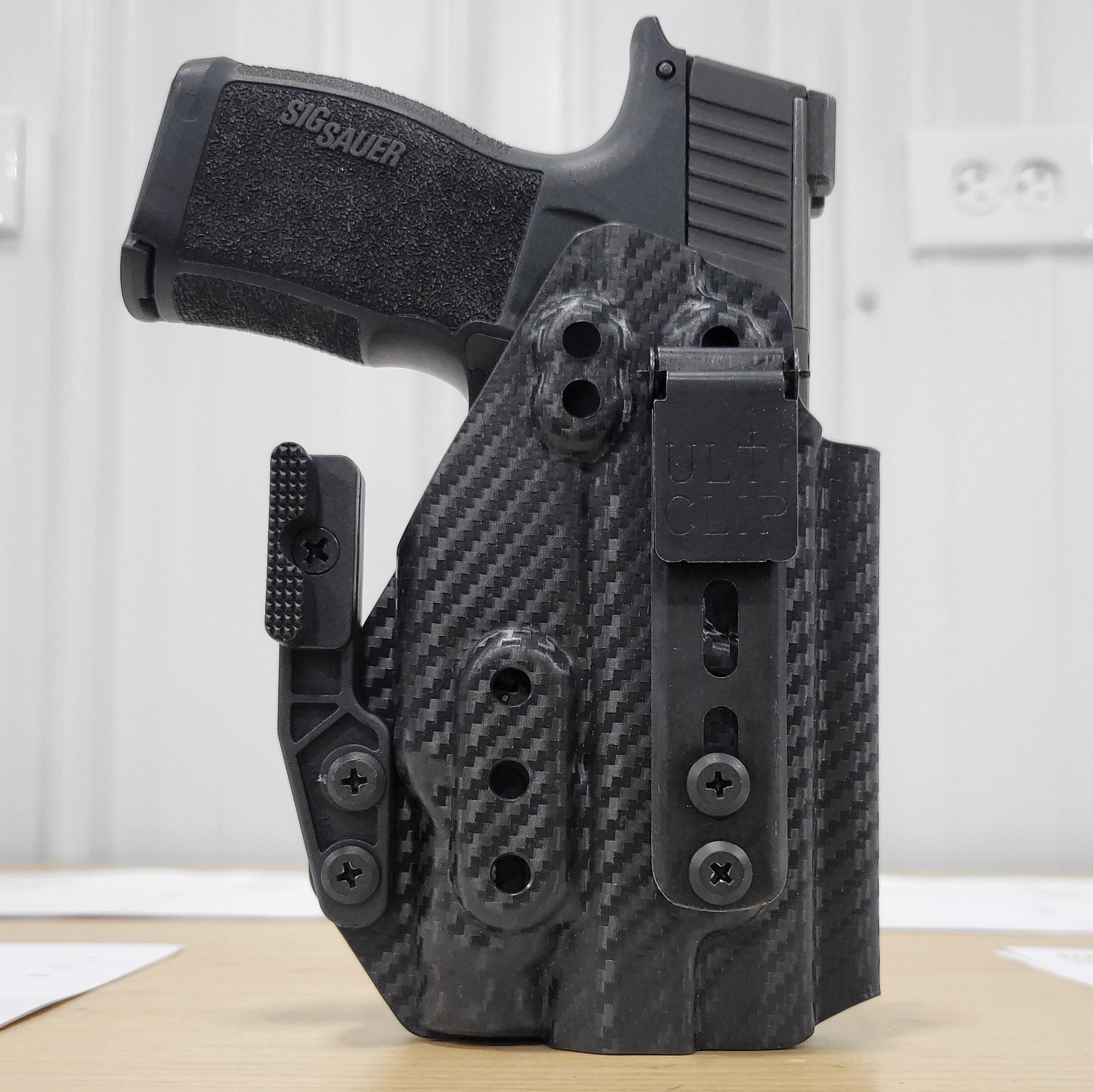 Inside waistband holster designed to fit the Sig Sauer P365 and P365XL pistol series with the Tactical Development Pro Ledge Tactical Application Rail and Streamlight TLR-7 Sub light mounted to the weapon.  This holster will fit the Sig P365, P365X, P365XL Spectre, P365 XL RomeoZero, P365X RomeoZero, P365 SAS and P365XL Spectre Comp with the Tactical Development Pro Ledge Tactical Application Rail and TLR-7 Sub.