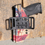 Outside Waistband Taco Style Holster designed to fit the Smith and Wesson M&P 10MM M2.0 pistol with thumb safety. The holster is designed to fit both the 4" and 4.6" barrel lengths.  Fit and function of each holster is checked with the actual 4.6" pistol with thumb safety before they are packaged and shipped. 