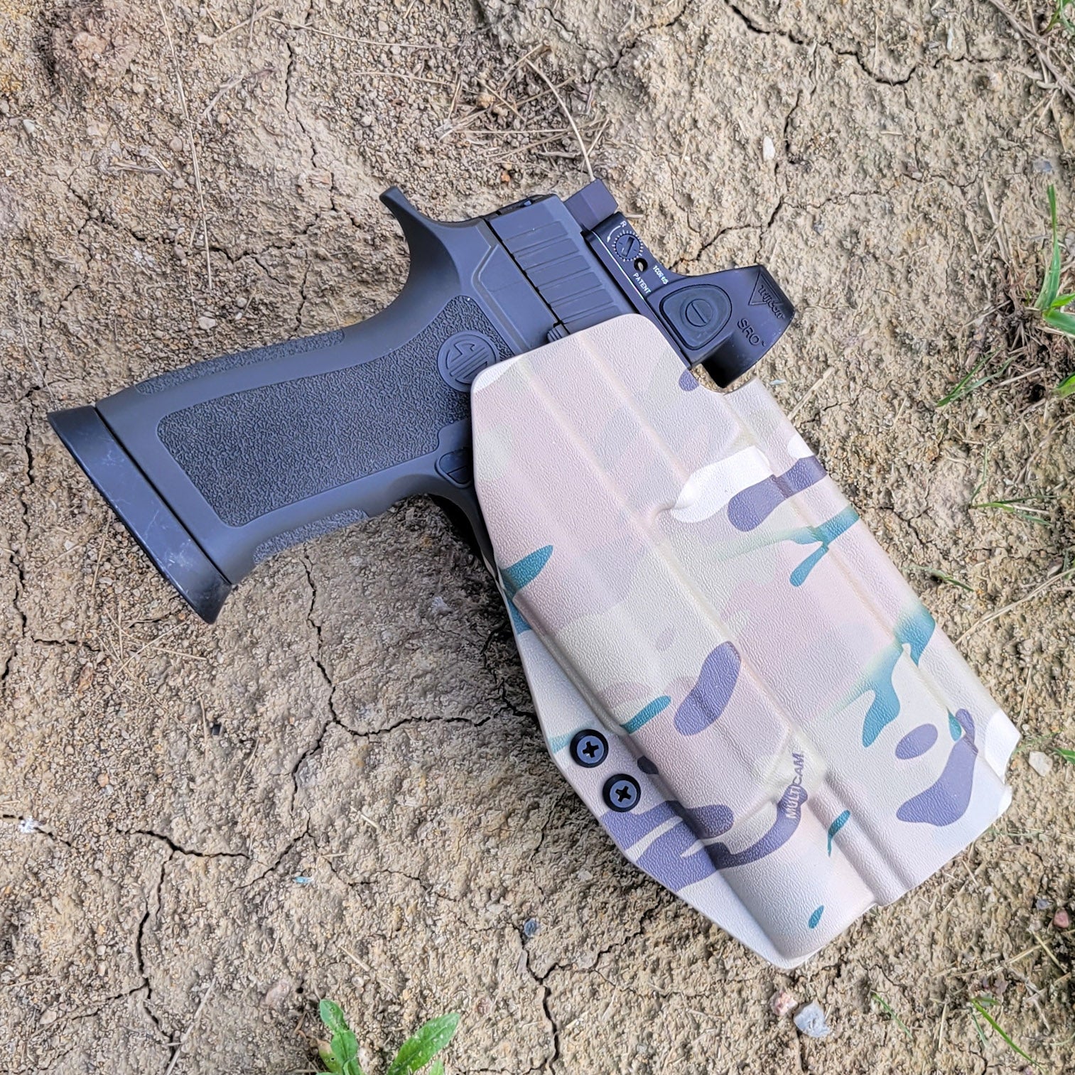 Outside Waistband Kydex Holster designed to fit the Sig Sauer P320 Full Size, M18, M17, X-Five, and Carry pistols with the Surefire X300U-A or X300U-B light & GoGuns USA Gas Pedal mounted to the pistol. Cleared for red dot sights and front suppressor height sights up to 3/8 tall.  Made in the USA