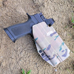 Outside Waistband Kydex Holster designed to fit the Sig Sauer P320 Full Size and Carry pistols with the Surefire X300U-A or X300U-B light and Align Tactical Thumb Rest Takedown Lever mounted to the pistol. Adjustable retention, profile cut to clear red dot sights, and suppressor height front sight. Made in the USA.