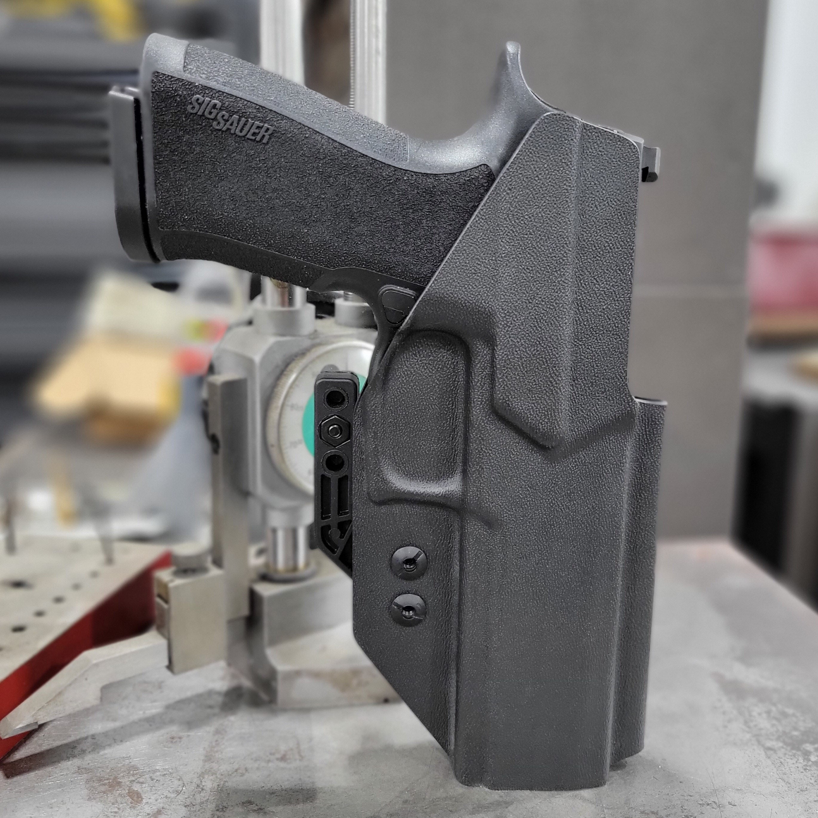 Our Left Hand Inside Waistband IWB Kydex Taco Style Holster designed to fit the Sig Sauer 10MM . Full sweat guard, adjustable retention, open muzzle, and profiled for a red dot sight. Proudly made in the USA for veterans and law enforcement. 10 MM P320-XTEN, P320 X Ten or P 320 XTEN.