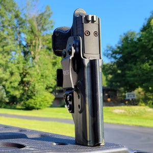 Inside Waistband IWB Kydex Taco Style Holster designed to fit the Sig Sauer 10MM . Full sweat guard, adjustable retention, open muzzle, and profiled for a red dot sight. Proudly made in the USA for veterans and law enforcement. 10 MM P320-XTEN, P320 X Ten or P 320 XTEN.
