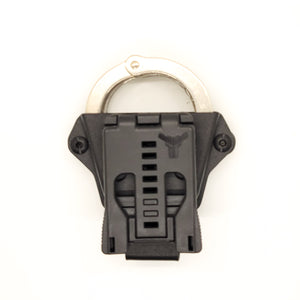 Our Kydex Smith and Wesson Handcuff Holster is formed from a precision machined mold designed around the Smith and Wesson chain style handcuffs. Retention of the holster is set with a real pair of cuffs so that the carrier will not allow the cuffs to be removed without a brisk pull. The carrier works well on Molle. 