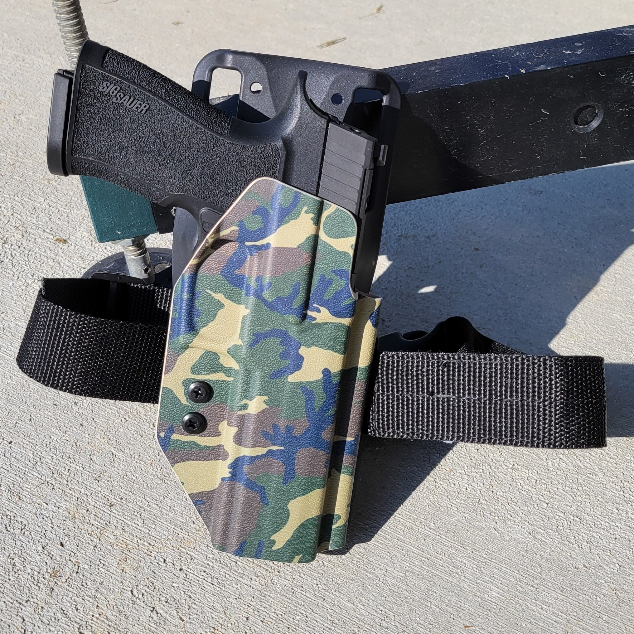 Outside Waistband Kydex Duty, Hunting, and Competition Style Kydex Holster designed to fit the Sig Sauer P320-XTEN 10MM pistol. Open Muzzle, Full Sweat Guard, Adjustable Retention. Profile cut for red dot sights and optics on the pistol. Made in the USA. 10 for the Win! P 320 XTen X Ten X10 X 10 10MM