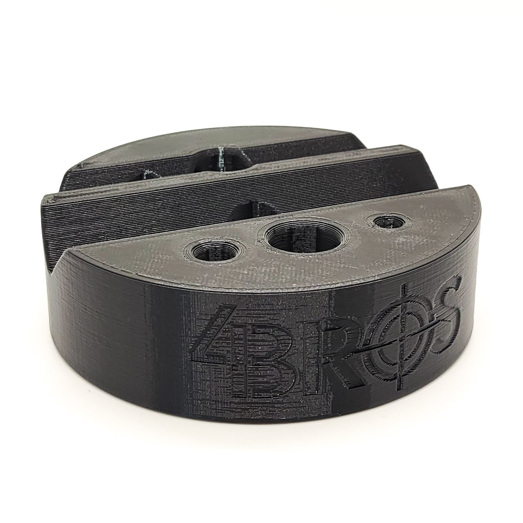 Our 3D-printed Armorer & Gunsmith Universal Bench Block makes the removal of pins from firearms & devices simple, easy, and quick. With one flat section, two grooves, and three hole sizes this block will provide a solid surface to hold frames, receivers, and slides while tapping out pins and not marring the finish.