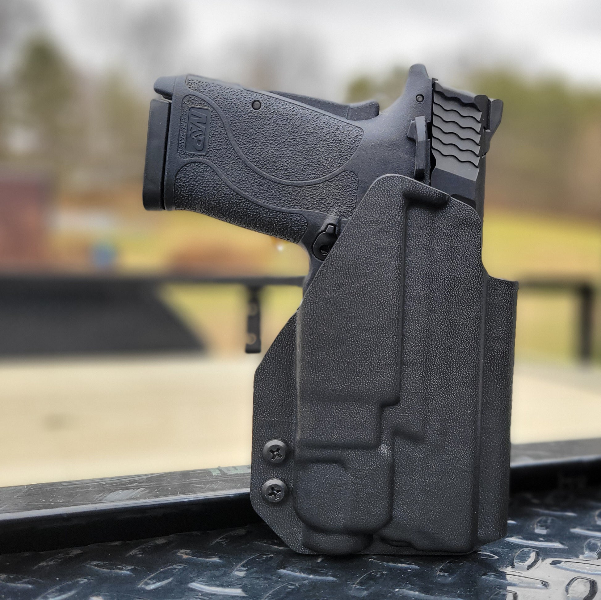 For the best Outside Waistband Kydex holster designed to fit the Smith & Wesson M&P 9 Shield EZ with Streamlight TLR-7 or TLR-7A weapon-mounted light, shop 4Bros. Full Sweat guard Adjustable Retention minimal material and smooth edges to reduce printing Thermoplastic Kydex for durability 9EZ EZ9 S&W Easy 9