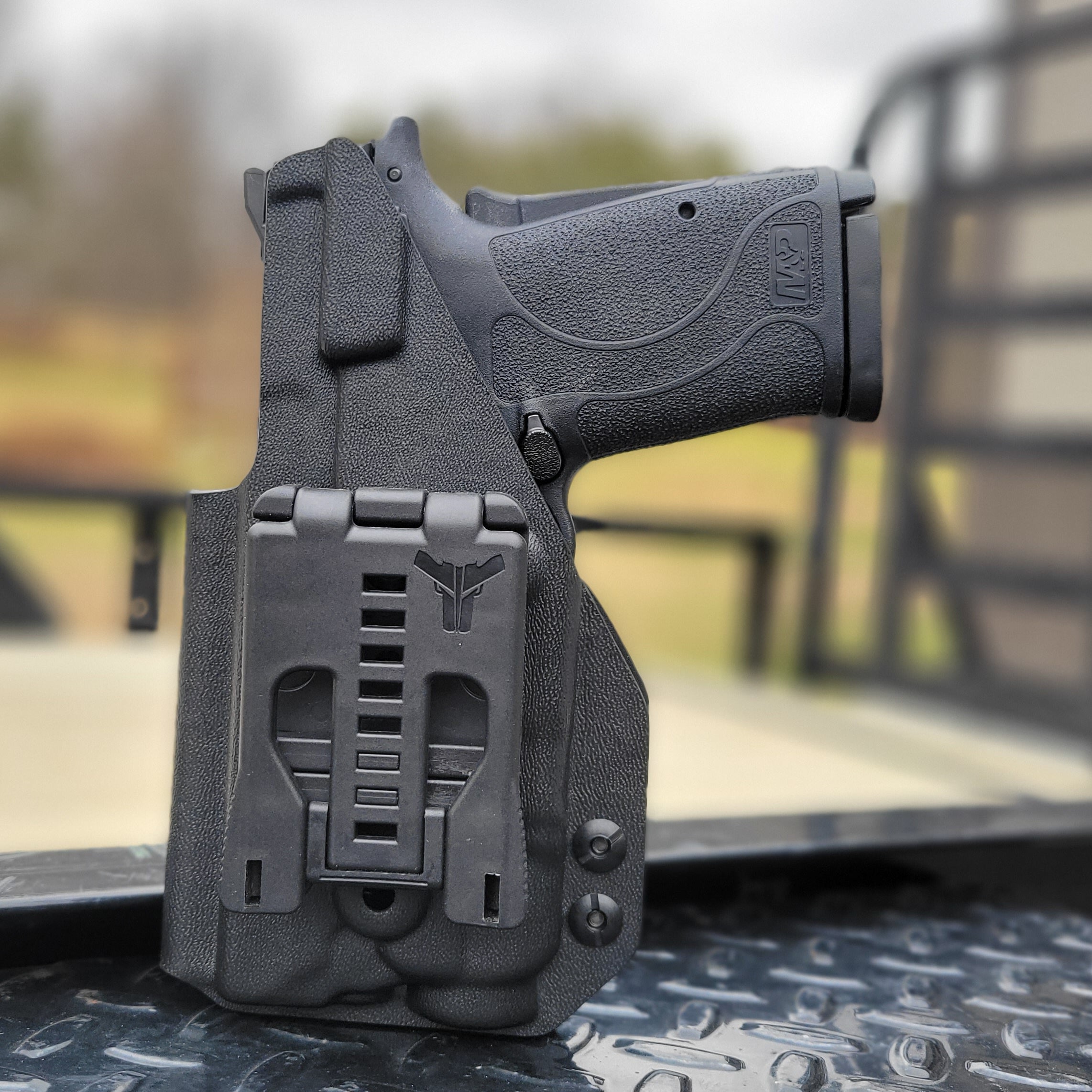 For the best Outside Waistband Kydex holster designed to fit the Smith & Wesson M&P 9 Shield EZ with Streamlight TLR-7 or TLR-7A weapon-mounted light, shop 4Bros. Full Sweat guard Adjustable Retention minimal material and smooth edges to reduce printing Thermoplastic Kydex for durability 9EZ EZ9 S&W Easy 9