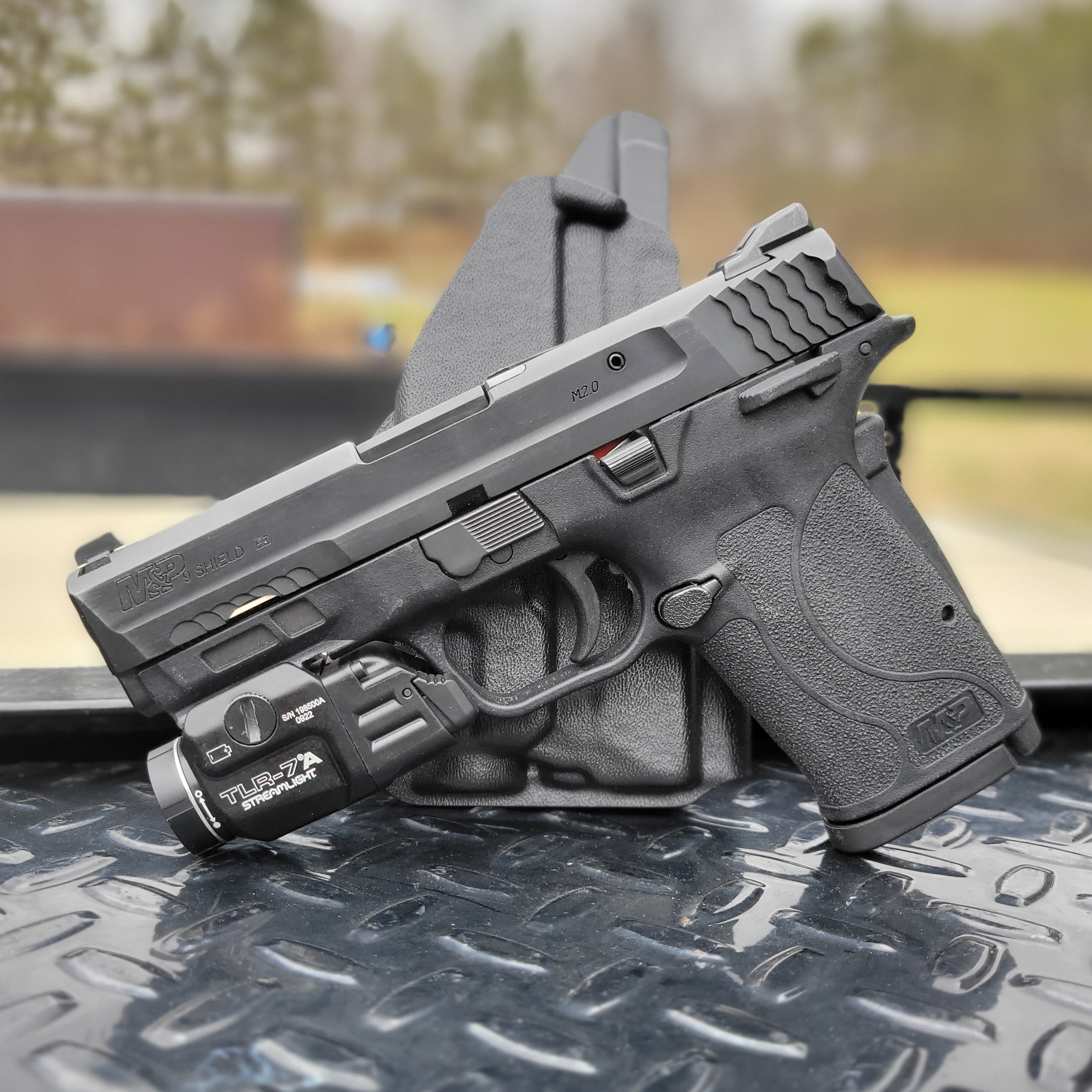 For the best Outside Waistband Kydex holster designed to fit the Smith & Wesson M&P 9 Shield EZ with Streamlight TLR-7 or TLR-7A weapon-mounted light, shop 4Bros. Full Sweat guard Adjustable Retention minimal material and smooth edges to reduce printing Thermoplastic Kydex for durability 9EZ EZ9 S&W Easy 9