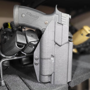 Outside Waistband Kydex Holster designed to fit the Full Size and Carry P320 series with Streamlight TLR-1 and TLR-1HL weapon mounted light and GoGuns USA Gas Pedal Holster will accommodate the M17, M18 and X-Five models as well as the Carry and Compact. The holster retention is on the light itself. Made in the USA