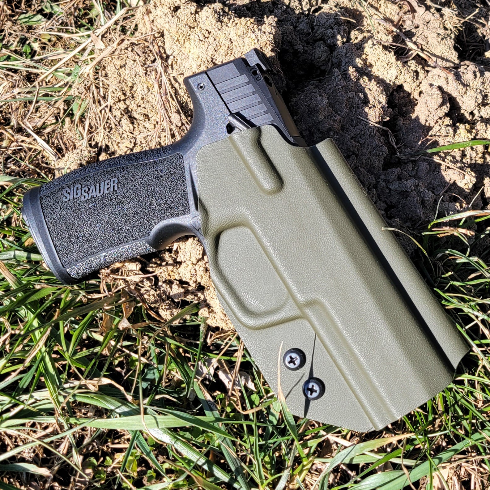 For the best Outside Waistband OWB Kydex Holster designed to fit the Sig Sauer P322 22 Long Rifle Pistol, look to Four Brothers. Perfect for competition shooting. Full sweat guard, open muzzle, adjustable retention, minimal material, & smooth edges to reduce printing. Proudly made in the USA. P 322 22 LR