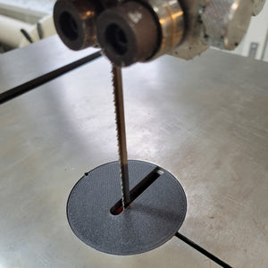This 3D Printed insert is a direct replacement for the aluminum table insert for the Jet JWBS-14SFX Bandsaw, model number JT9-714400K-JWBS14-SFX 14. The OEM part number for the original aluminum table is JET® OEM REPLACEMENT TABLE INSERT- JWBS14SFX-150 2.748" diameter, .125" thick at table, and .250" overall thickness