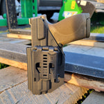 For the 2023 Best Outside Waistband OWB Kydex Holster designed to fit the Smith and Wesson M&P 4.25”, 4", and 3.6 Full Size and Compact pistol, shop Four Brothers Holsters. Holster fits M1.0 and M2. 0 generations. Full sweat guard, adjustable retention, profiled for a red dot sight. Made in the USA. M1 M2
