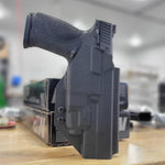 The best Outside Waistband OWB Kydex Holster designed to fit the Smith & Wesson M&P M2.0 5" pistols with the Streamlight TLR-7 or TLR-7A light mounted to the pistol. Full sweat guard, adjustable retention, minimal material, and smooth edges to reduce printing. Cleared for red dot sights. Proudly made in the USA.