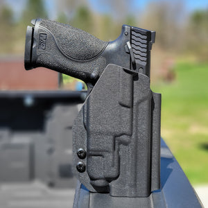 Best Outside Waistband OWB Kydex Holster designed to fit the Smith & Wesson M&P M2.0 9mm 4.25" & 4" pistols with the Streamlight TLR-7 or TLR-7A light mounted to the pistol. Full sweat guard, adjustable retention, minimal material, & smooth edges to reduce printing. Cleared for red dot sights. Made in the USA.
