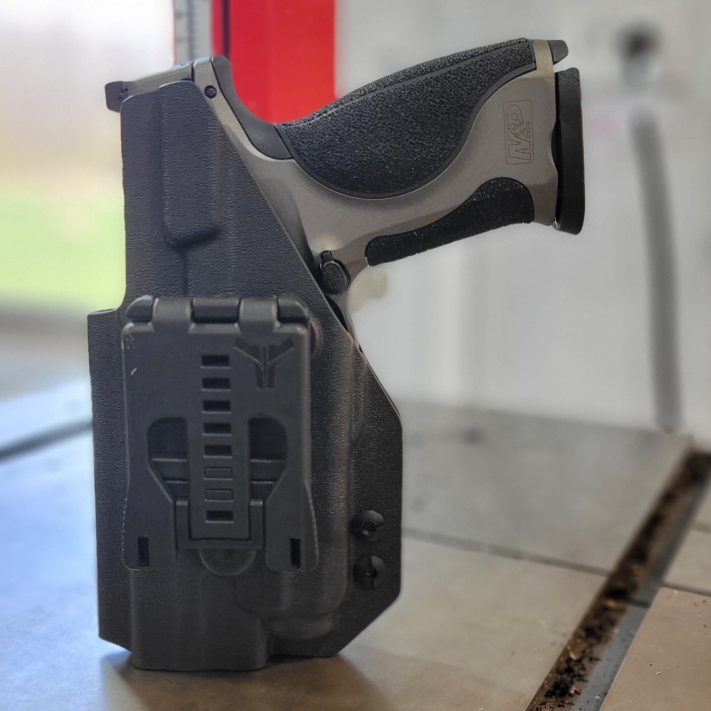 2023 Best Outside Waistband OWB Kydex Holster designed to fit the Smith & Wesson M&P M2.0 Metal pistols with the Streamlight TLR-7 or TLR-7A light mounted to the pistol. Full sweat guard, adjustable retention, minimal material, and smooth edges to reduce printing. Cleared for red dot sights. Proudly made in the USA.