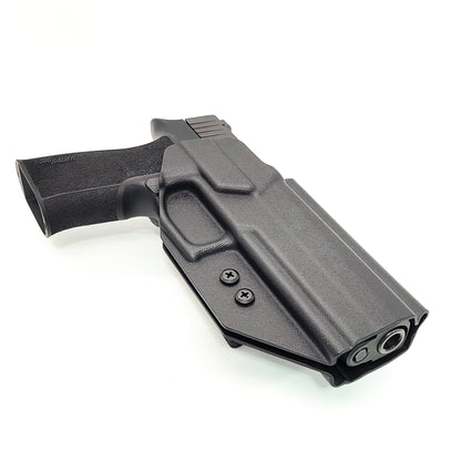 For the best Outside Waistband OWB Holster for the Sig Sauer P320-XTEN 10MM & GoGunsUSA Gas Pedal attached to the pistol shop Four Brothers 4BROS Holsters.