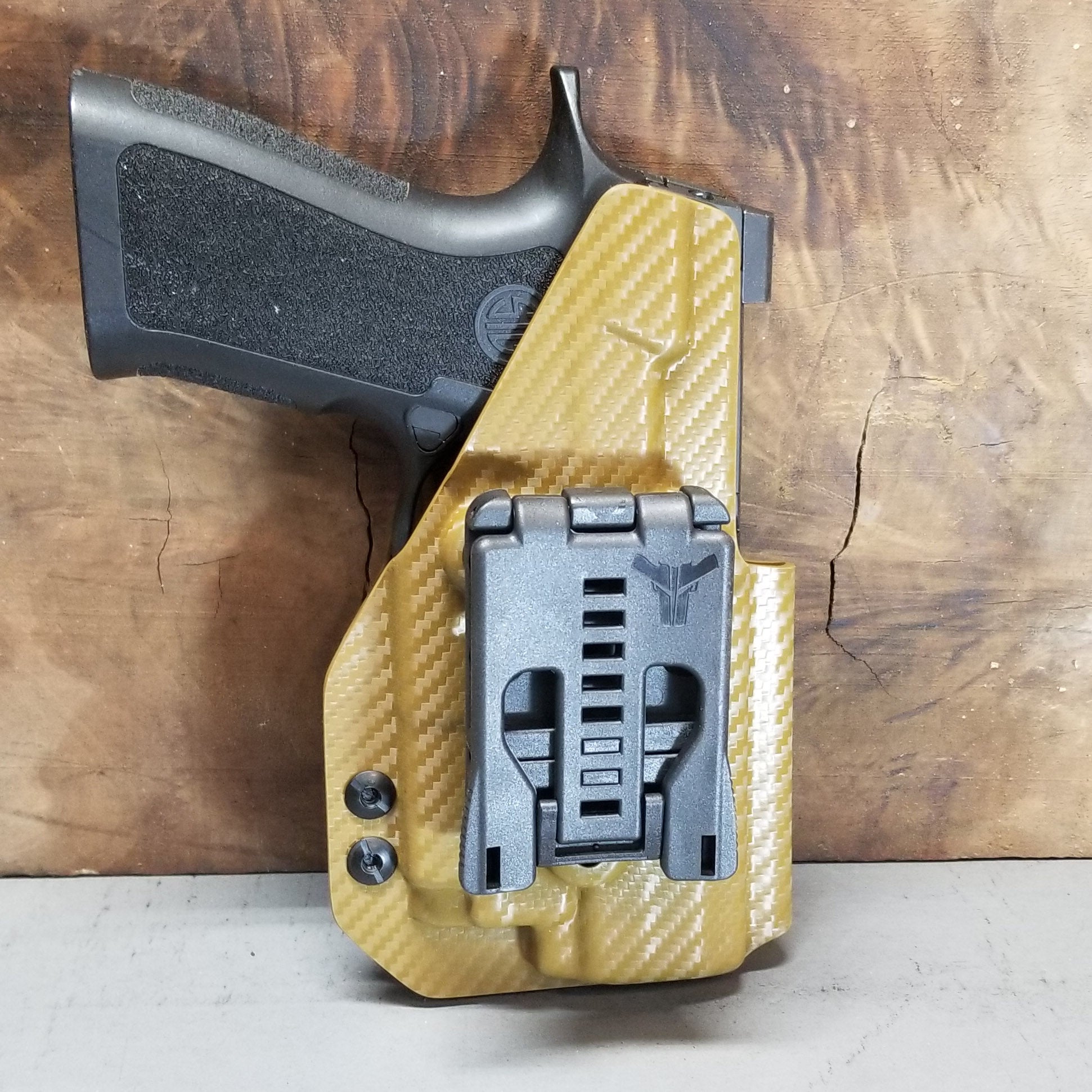 For the best Outside Waistband OWB Holster for the Sig Sauer Carry, Compact, and M18 P320 series pistols & Olight PL-Mini 2 shop Four Brothers 4BROS Holsters.