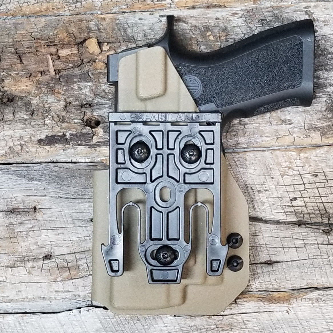 For the best Outside Waistband OWB Holster for the Sig Sauer Carry, Compact, and M18 P320 series pistols & Olight PL-Mini 2 shop Four Brothers 4BROS Holsters.