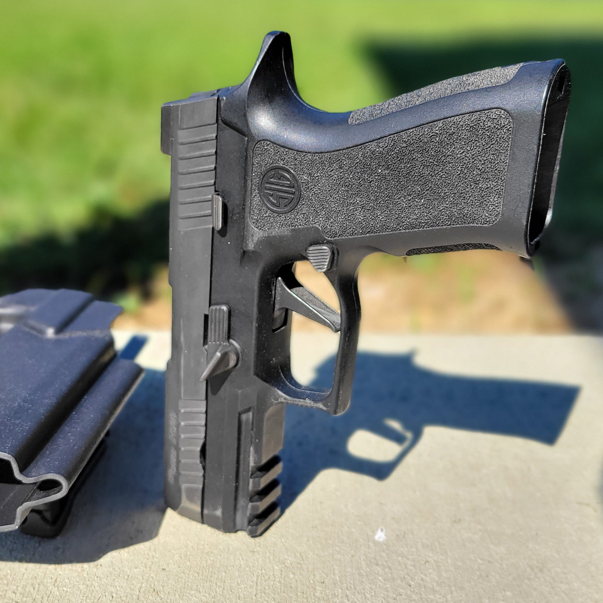 For the best Outside Waistband OWB Holster for the Sig Sauer P320 Carry, Compact, or M18 with the Align Tactical Thumb Rest shop Four Brothers 4BROS Holsters.