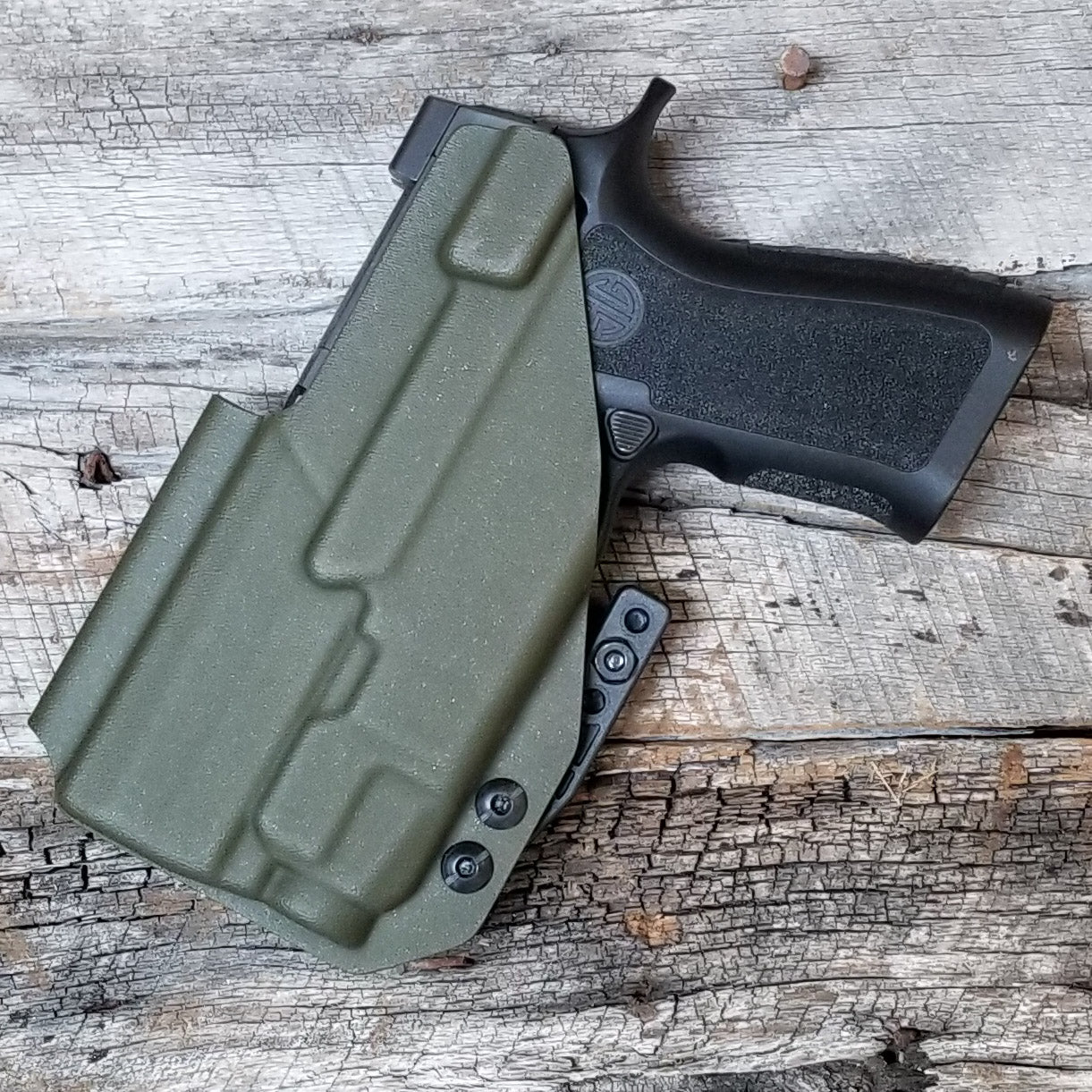 For the best Inside Waistband IWB AIWB Holster for the Sig Sauer P320 Compact, Carry or M18 pistols & Streamlight TLR-7 X or A, shop Four Brothers holsters.