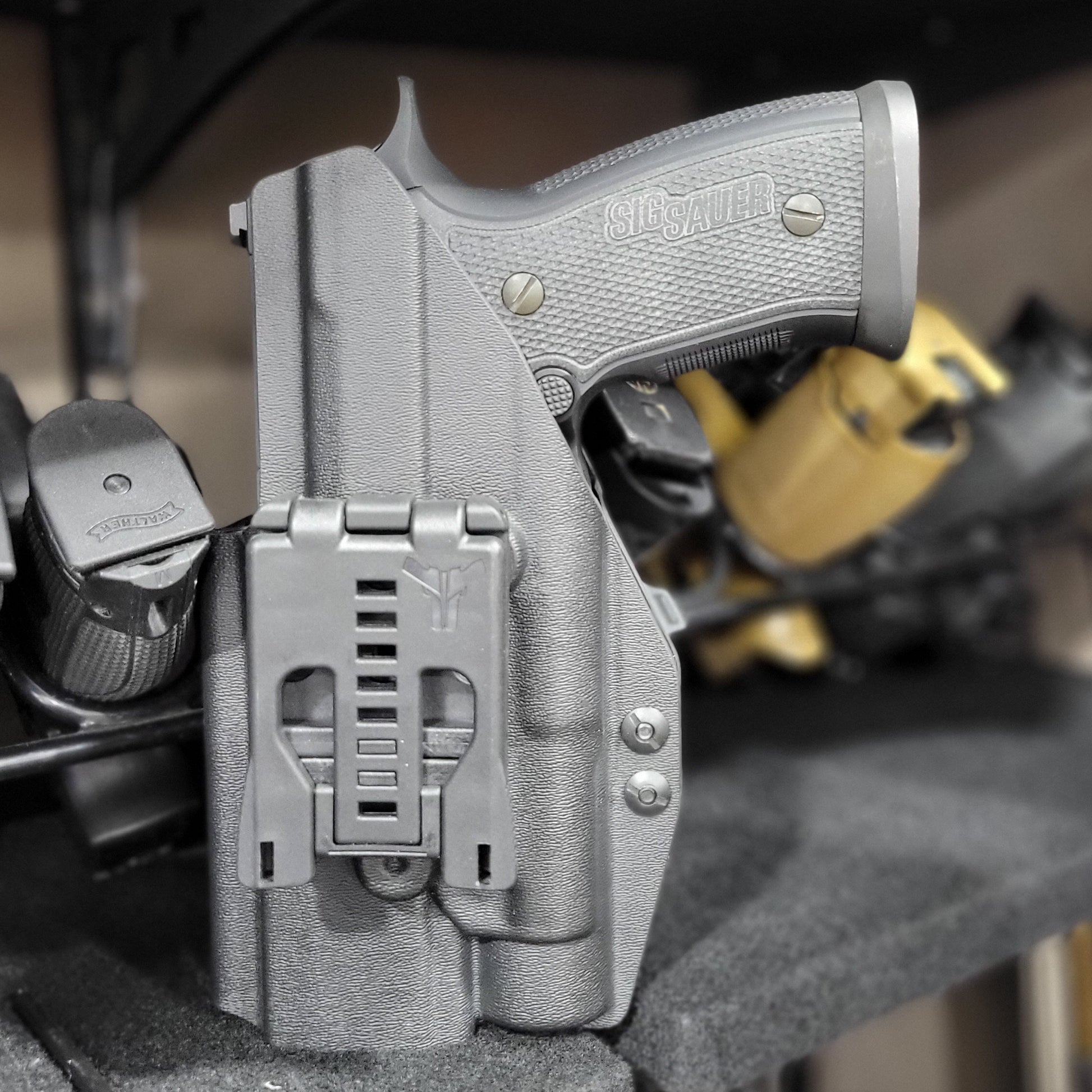 For the best Outside Waistband Holster for the Full Size or Carry P320 & Streamlight TLR-1 or TLR-1HL & Align Tactical Thumb Rest shop Four Brothers Holsters.