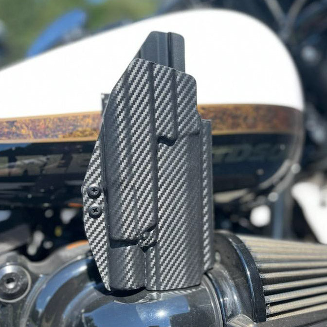 For the best OWB Holster for the Sig Sauer P320 X5, Carry, M17. M18 & X-Five & Surefire X300U-A or B & Align Tactical Thumb Rest shop Four Brothers Holsters.