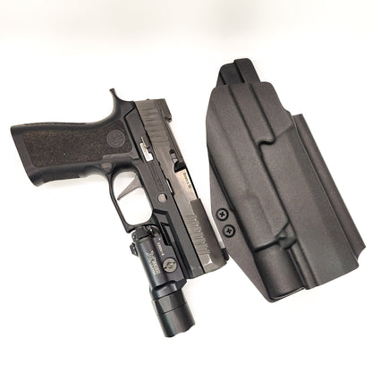 For the best OWB Kydex Holster for the Sig Sauer P320 Full-Size M18, M17, X-Five Legion & Carry pistols & Surefire X300U-A or B shop  Four Brothers Holsters.