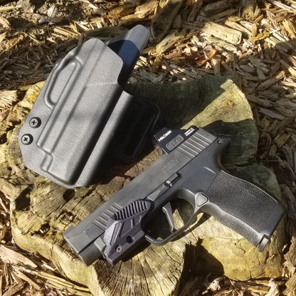 For the best OWB holster for the Sig Sauer P365XL, P365X, P365XL Spectre,  P365X/XL RomeoZero & P365 SAS with GoGuns Gas Pedal shop Four Brothers Holsters.