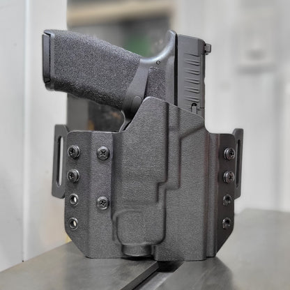 OWB Kydex holster for the Springfield Hellcat Pro with TLR-8 X & TLR-8 A. Pancake holster, adjustable retention, open muzzle, optic/red dot ready. Made in USA.
