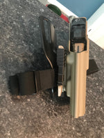 For the best OWB Outside Waistband Duty and Competition Holster designed to fit the Canik TP9 TP9SFX full-size pistols, shop Four Brothers Holsters. Perfect for USPSA, 3-Gun, Steel Challenge, and other competitive shooting sports. Adjustable retention, Open muzzle for threaded barrels. Made in the USA